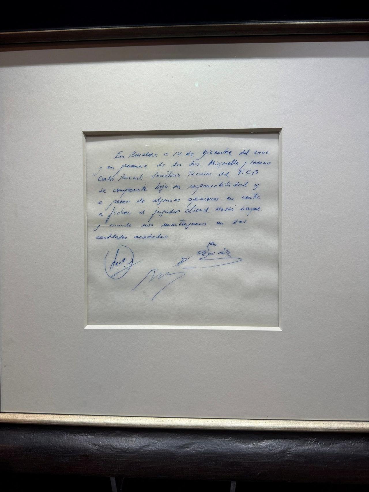 The original December 14, 2000 paper napkin contract written in blue ink by Carles Rexach