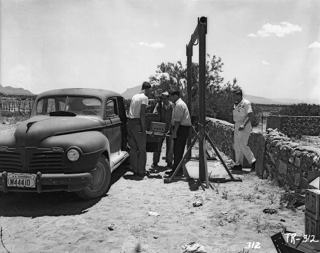 Harry Daghlian assembling the plutonium core tamper plug for the Trinity test
