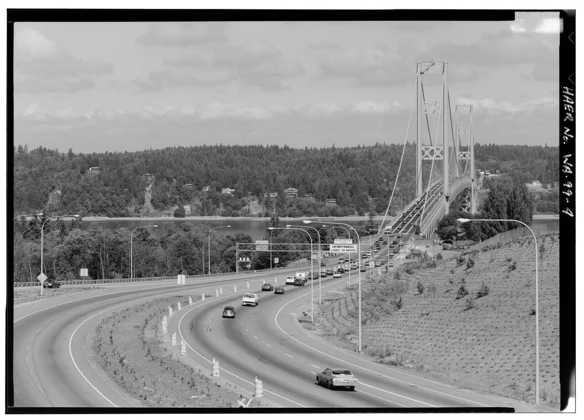 GENERAL VIEW OF EASTERN APPROACH AND ROADWAY - Tacoma Narrows Bridge, Spanning Narrows at State Route 16, Tacoma, Pierce County, WA HAER WASH,27-TACO,11-4